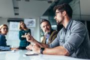Business people sitting around a table